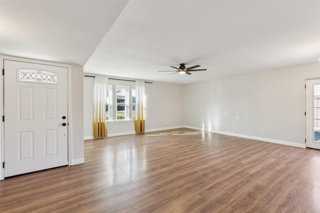 entrance foyer featuring ceiling fan and wood-type flooring