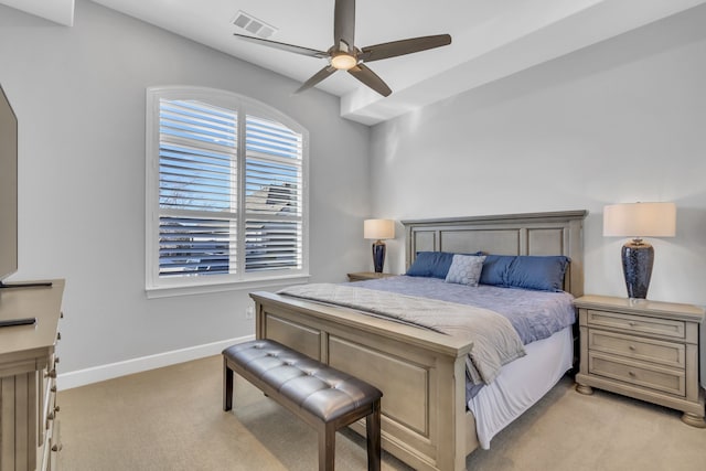 bedroom with light carpet and ceiling fan