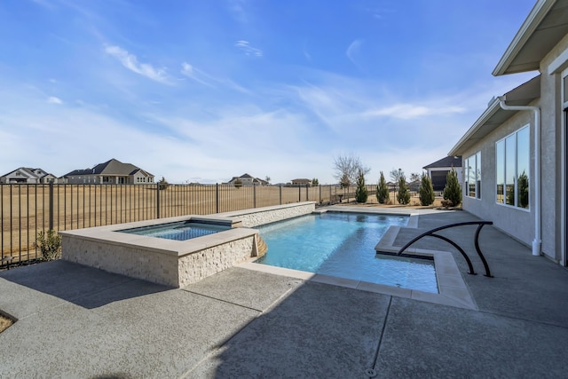 view of pool featuring an in ground hot tub