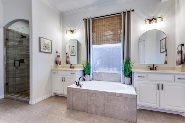 bathroom featuring crown molding, tile patterned floors, vanity, and plus walk in shower