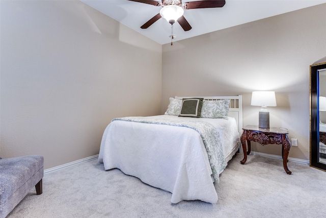 bedroom featuring ceiling fan, lofted ceiling, and carpet floors