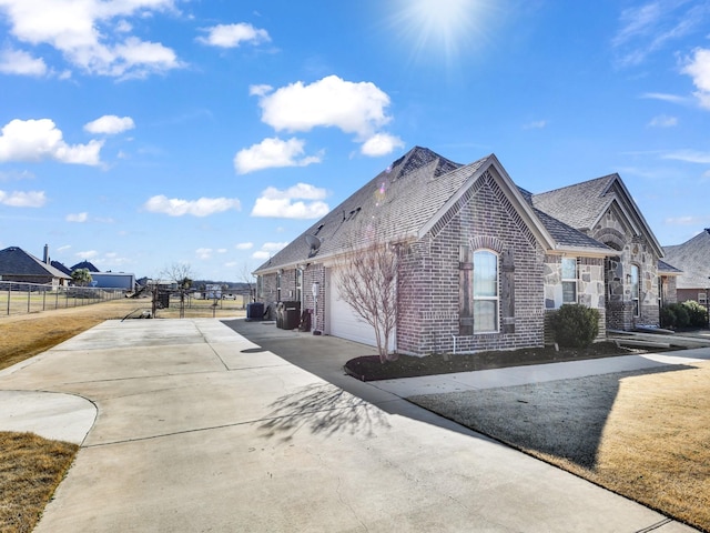 view of property exterior with a garage