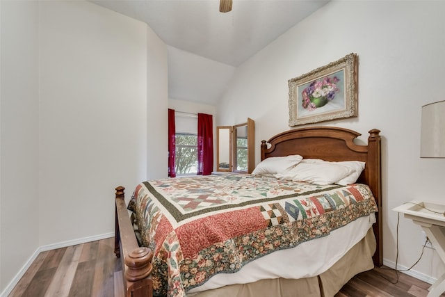 bedroom featuring vaulted ceiling, ceiling fan, and hardwood / wood-style floors