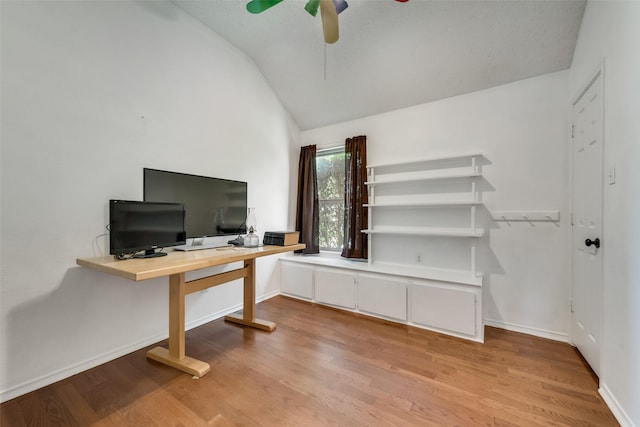 office featuring vaulted ceiling, ceiling fan, and light hardwood / wood-style floors