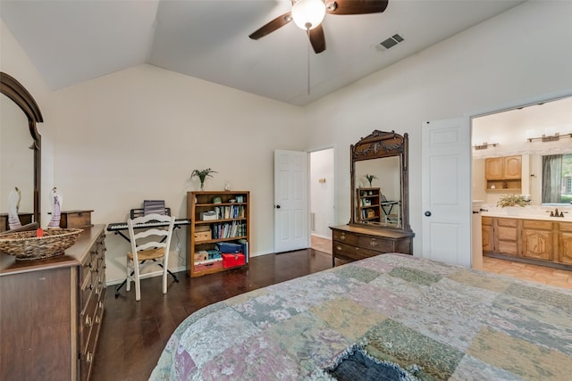 bedroom with lofted ceiling, sink, ceiling fan, ensuite bathroom, and dark hardwood / wood-style flooring