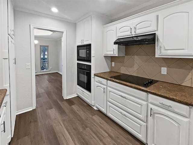 kitchen with white cabinetry, tasteful backsplash, black appliances, and dark hardwood / wood-style floors