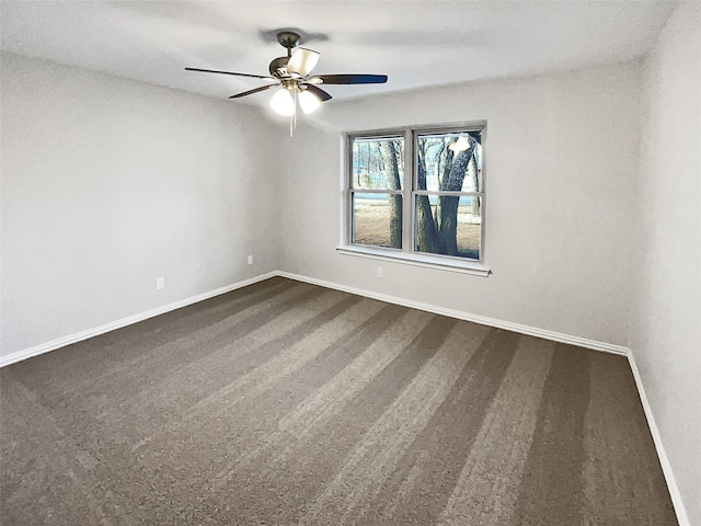 spare room with ceiling fan