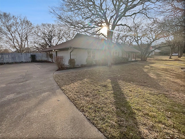 view of side of home with a garage