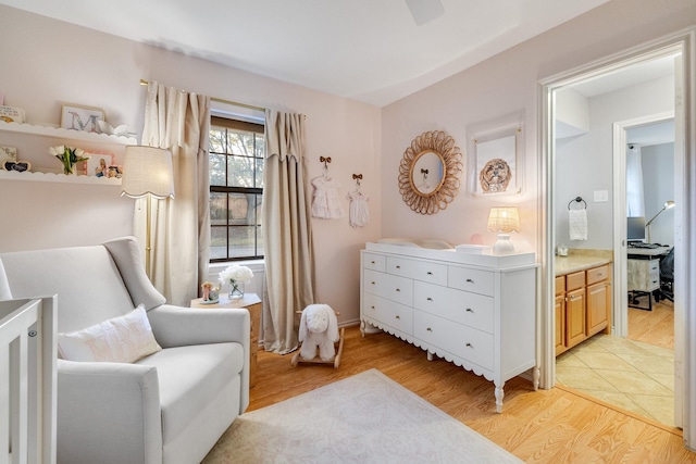 sitting room featuring light hardwood / wood-style flooring