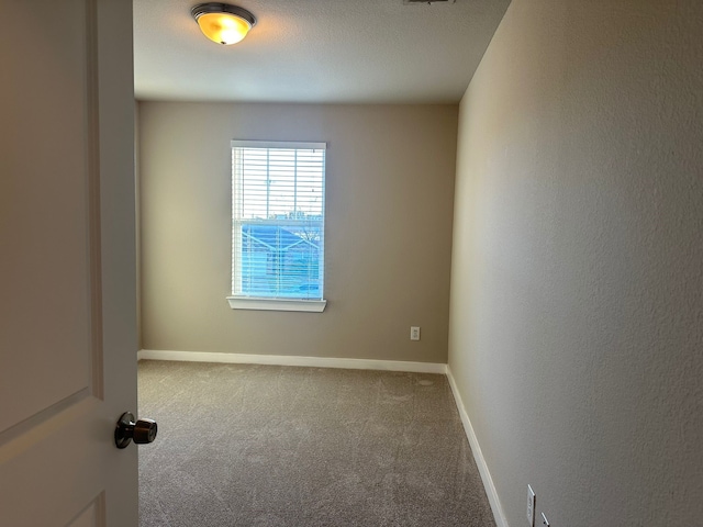 empty room with carpet floors