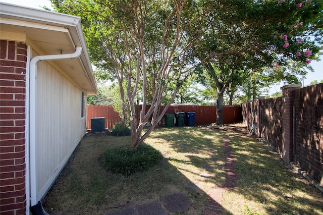 view of yard featuring central AC unit