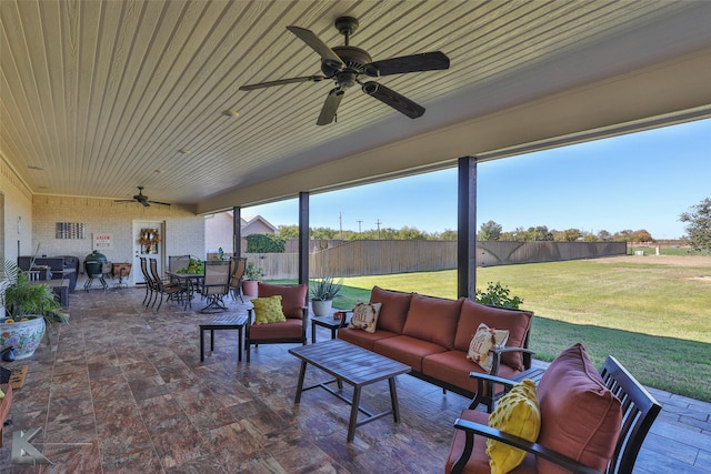 view of patio featuring outdoor lounge area and ceiling fan