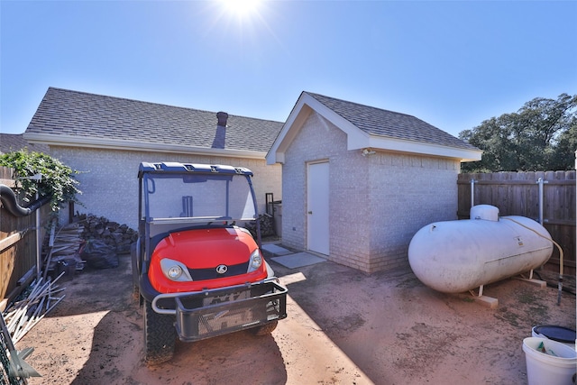 view of home's exterior featuring a shed