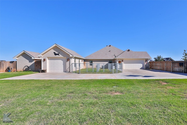 single story home featuring a garage and a front lawn