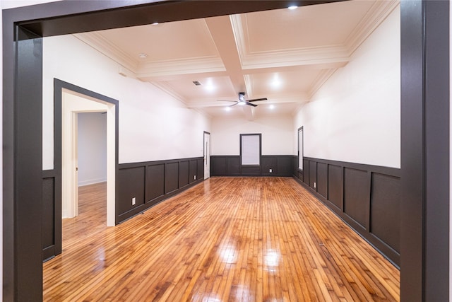 interior space with coffered ceiling, ceiling fan, light hardwood / wood-style flooring, and beamed ceiling