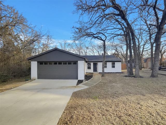 single story home with a garage