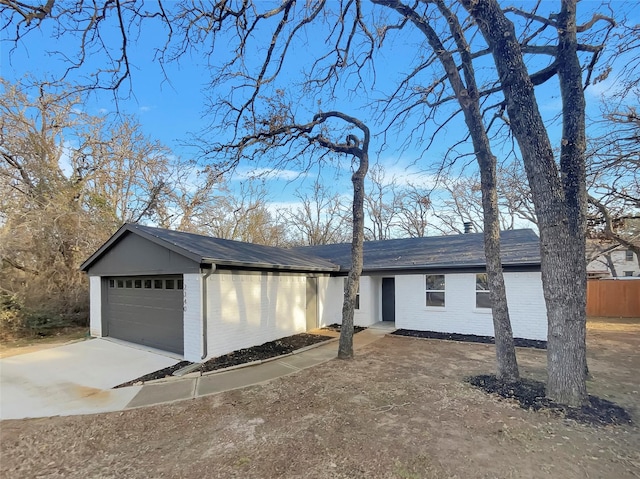 single story home with a garage