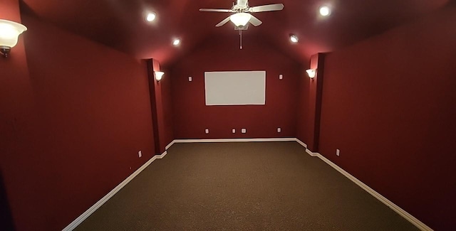 cinema room featuring ceiling fan, carpet flooring, and vaulted ceiling