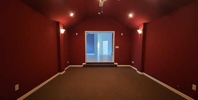 carpeted cinema featuring vaulted ceiling and ceiling fan