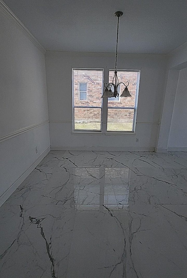 unfurnished dining area with ornamental molding