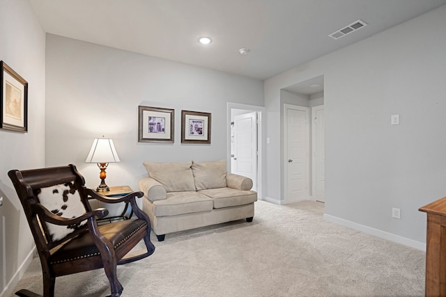 living area featuring recessed lighting, baseboards, visible vents, and carpet flooring