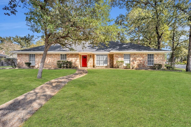 ranch-style home with a front yard