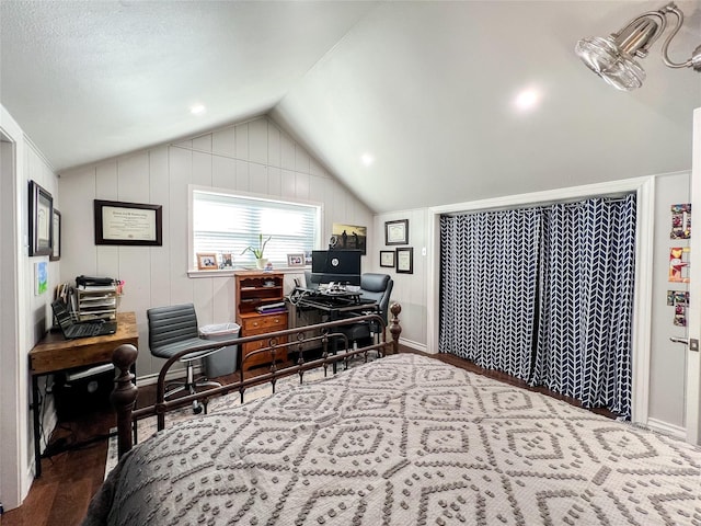 office space featuring hardwood / wood-style flooring and vaulted ceiling