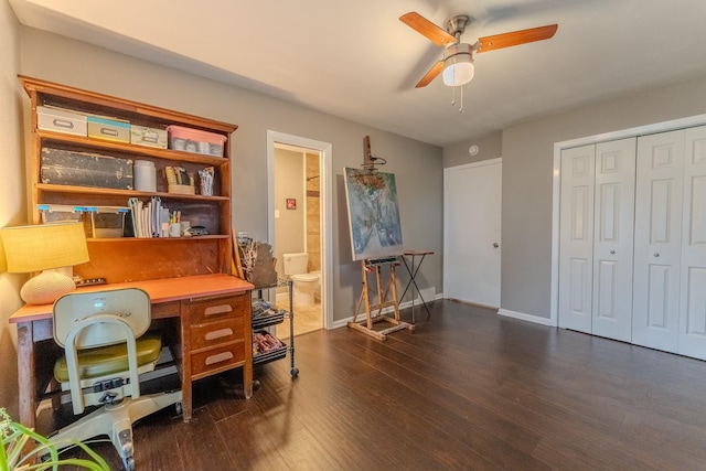 office with ceiling fan and dark hardwood / wood-style floors