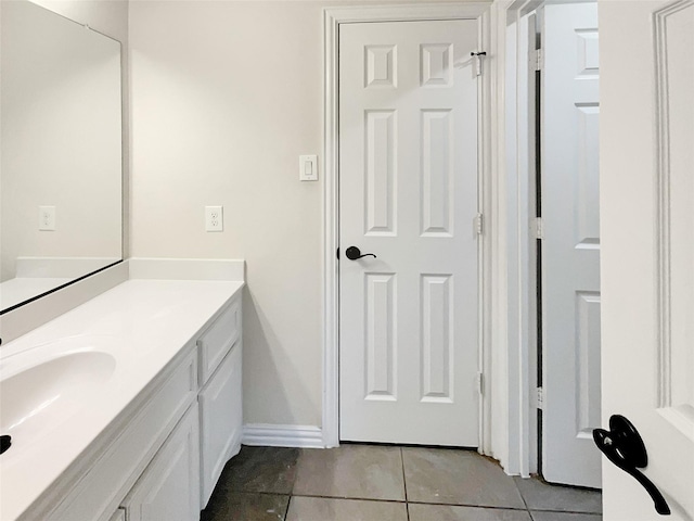 bathroom featuring vanity and tile patterned flooring