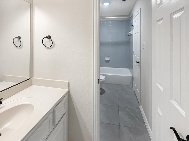 full bathroom featuring vanity, toilet,  shower combination, and tile patterned flooring