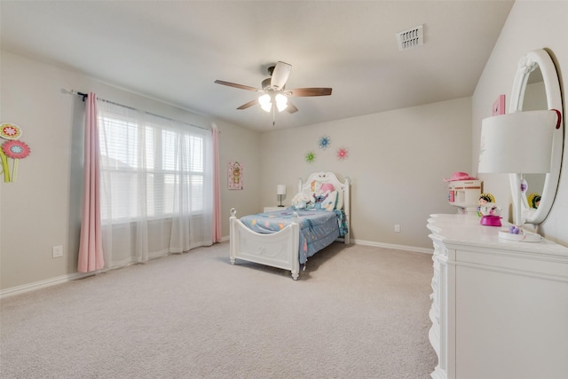 carpeted bedroom with ceiling fan