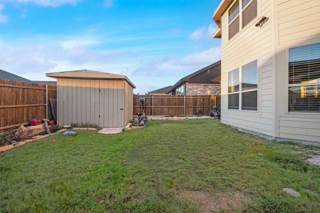 view of yard with a storage shed