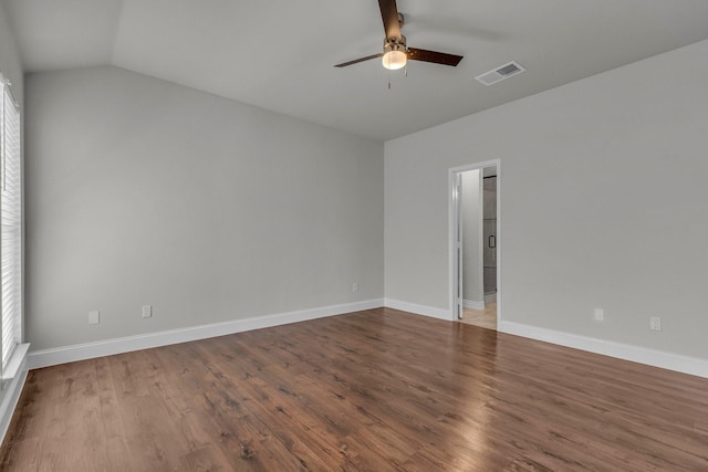 empty room featuring ceiling fan, wood-type flooring, and vaulted ceiling