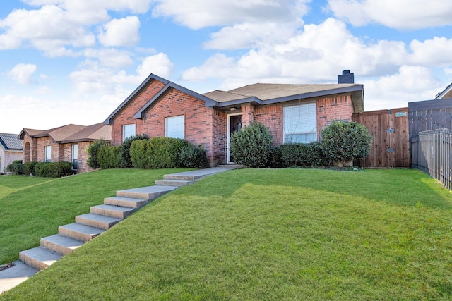 view of front of home featuring a front lawn