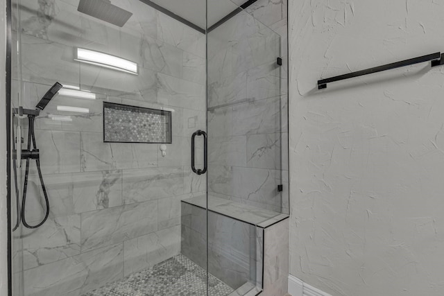 bathroom featuring an enclosed shower