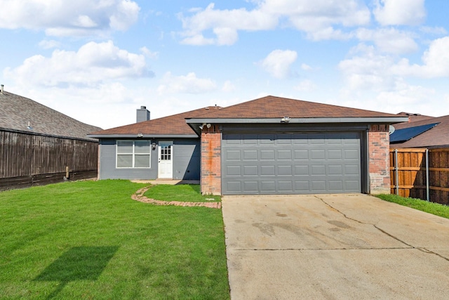 single story home featuring a garage and a front yard