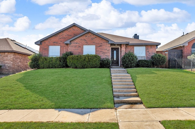 view of front facade with a front lawn