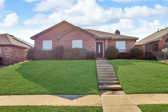 single story home with a front lawn