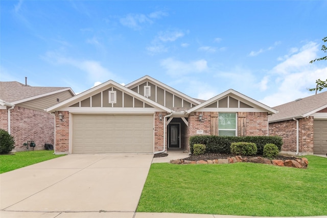 view of front of house with a garage and a front yard