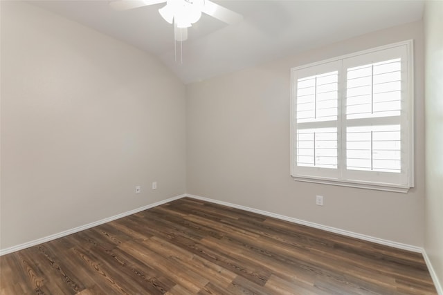 unfurnished room featuring dark hardwood / wood-style flooring, lofted ceiling, and ceiling fan