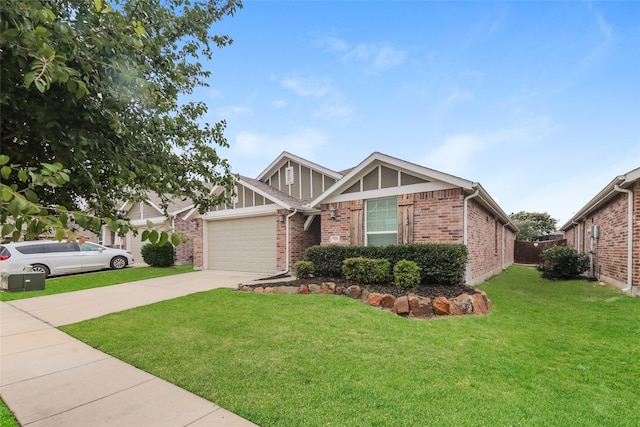 view of front of property featuring a garage and a front yard