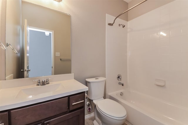 full bathroom featuring vanity, shower / tub combination, and toilet