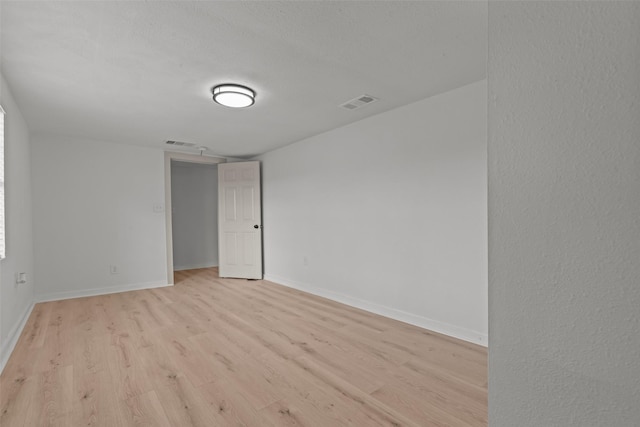 empty room featuring light hardwood / wood-style flooring