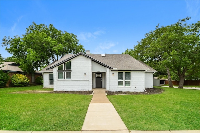 view of front of house with a front yard