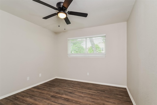 empty room with dark wood-type flooring