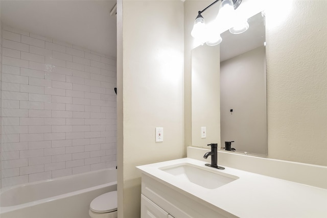 full bathroom with vanity, toilet, and tiled shower / bath combo