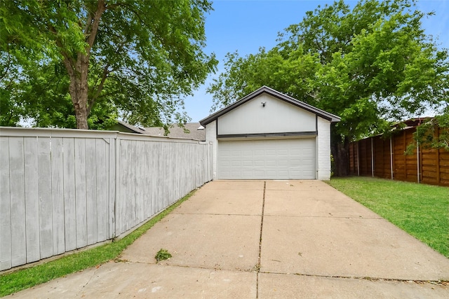 garage with a lawn