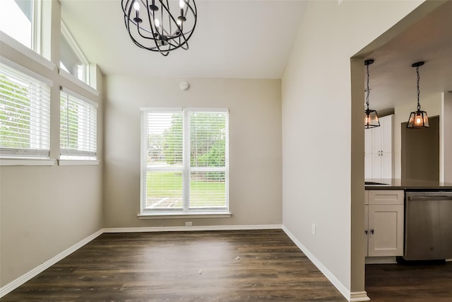 spare room featuring dark hardwood / wood-style floors