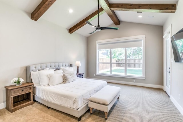 carpeted bedroom featuring ceiling fan and vaulted ceiling with beams