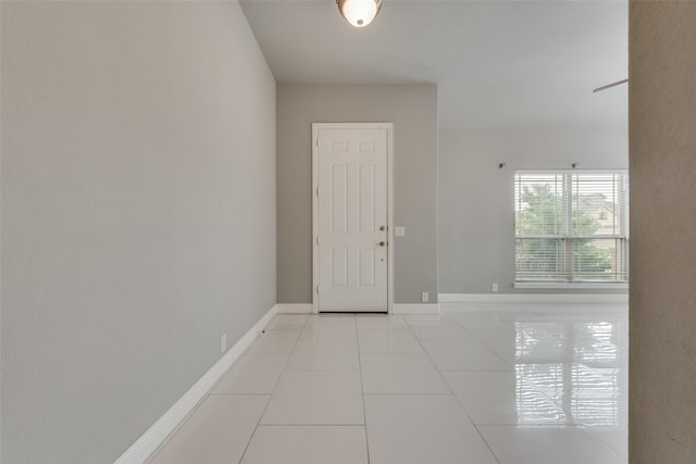 entryway with light tile patterned floors